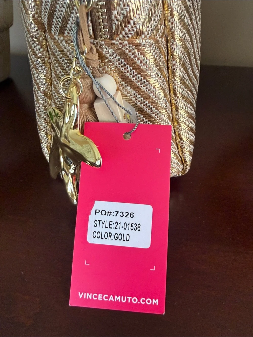 VINCE CAMUTO 💄IRIDESCENT GOLD-TONE COSMETIC BAG💄 WITH TASSEL CHARMS 🌟NWT🌟